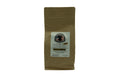 Kraft brown coffee bag with a label on a white background