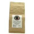 Kraft paper coffee bag with a label on a white background